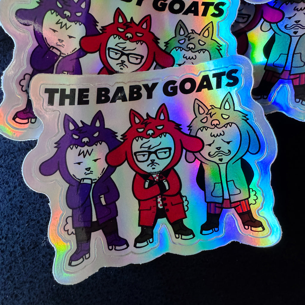 Holographic sticker of 'The Baby Goats' with colorful characters on a dark background
